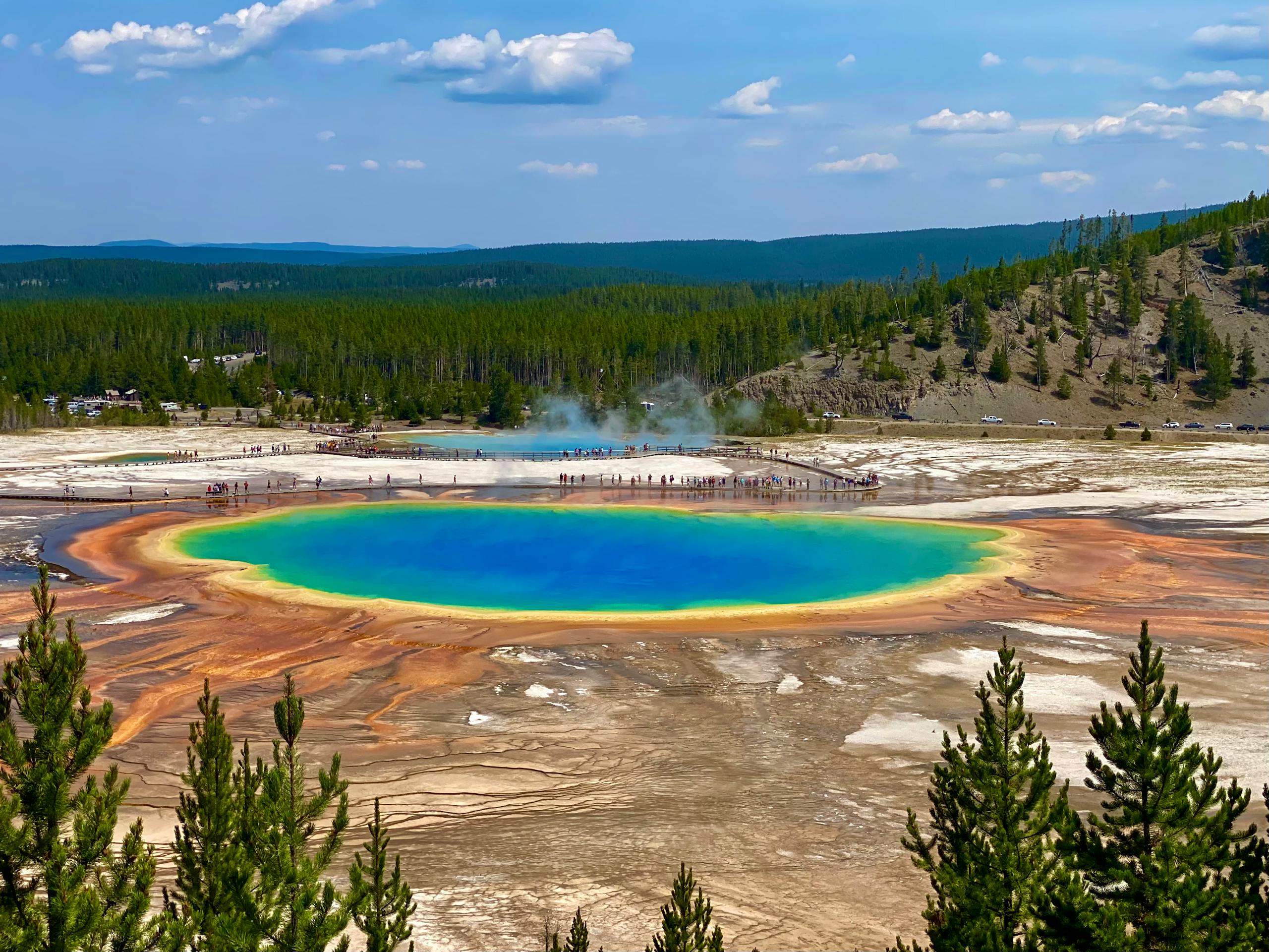 Stunning aerial view of the colorful Grand Prismatic Spring in Yellowstone, USA.